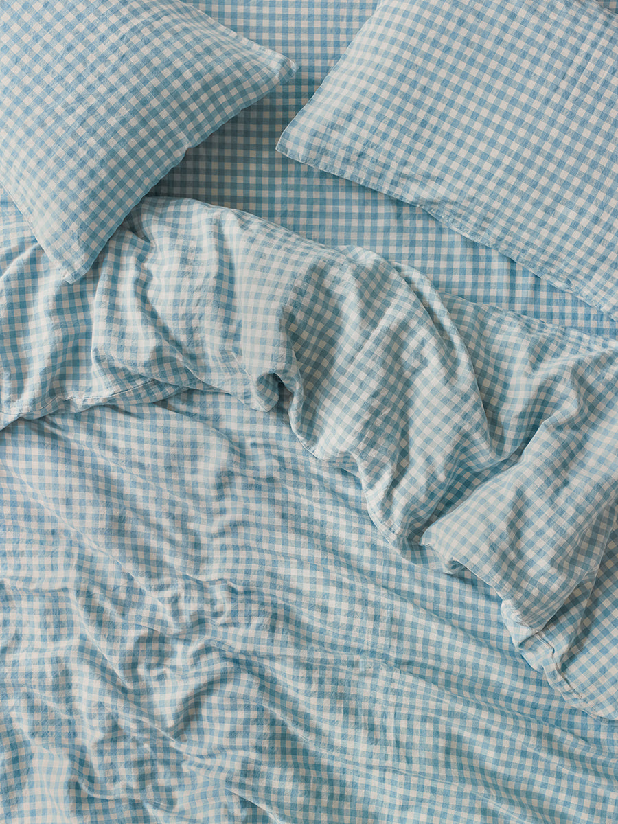 GINGHAM_LINEN_BLEND_BEDDINGWARM_BLUE_Overhead_copy